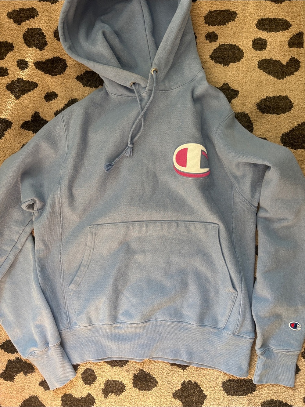 Champion Light Blue Crewneck Hoodie with Pink-Accented Logo